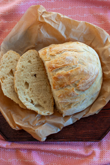 Dutch oven artisanal bread, sliced fresh from the oven.
