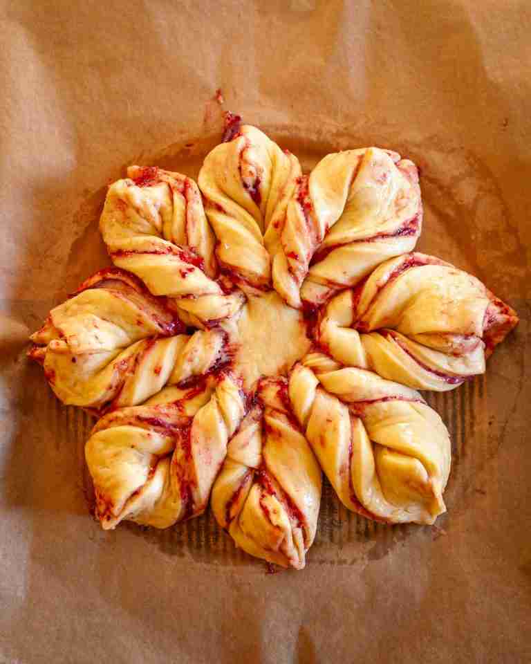 Snowflake pastry brushed with egg wash.