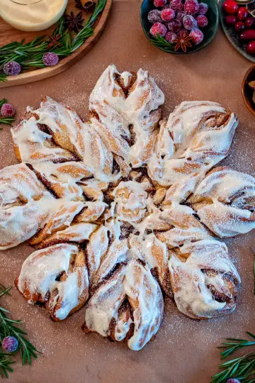 Eggnog spiced cinnamon roll snowflake.